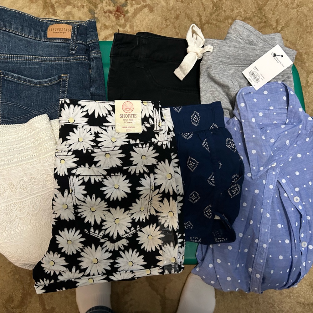 lot of seven juniors small and medium shorts and shirts